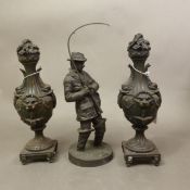 A bronzed resin figure of a fisherman, together with a pair of bronzed resin vases, height of