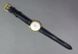 Rotary 9ct gold gentleman's wristwatch on a black leather strap.