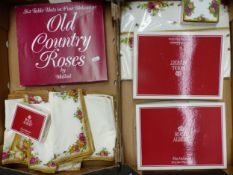 A collection of Royal Albert Old Country Roses, various boxed sets of table mats/coasters, and