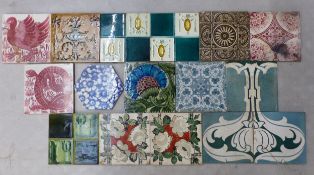 Collection of 16 early 20th-century fireplace/wall/floor tiles, various designs and patterns, mostly