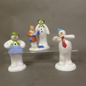 Three boxed Coalport Characters The Snowman figurines The Gift, The Welcome and The Soloist (3).