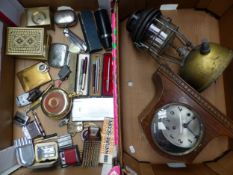 Mixed collection of items to include cigarette lighters and cases, keyrings, penknife, pens