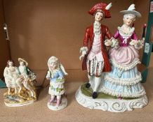 Large Continental figural group, together with two small figures, height of tallest 29cm (3).