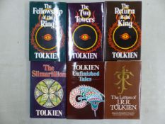 A collection of J.R.R. Tolkien books to include The Lord of The Rings trilogy, together with The