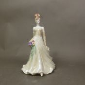 A Coalport limited edition Lady Figurine, The Modern Bride Collection Vienna, height 24cm.