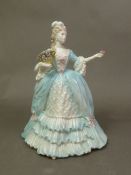 Coalport Compton & Woodhouse 'Marie Antoinette' limited edition figurine, height 23cm.