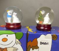 Two boxed Coalport Characters The Snowman snow/glitter globes, At the Party and Christmas Friends (