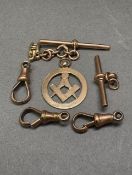 9ct rose gold items, including a Masonic watch fob, clasps, etc, combined 19.12g.