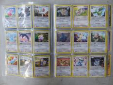 Folder containing approximately 250 Pokémon cards.