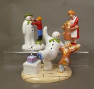 Three boxed Coalport Characters The Snowman figurines Adding a Smile, Treading the Boards and Hug