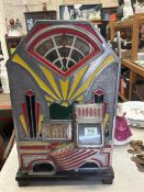 A Jennings Little Duke slot machine/one arm bandit, dating from the 1930s. In working order, playing