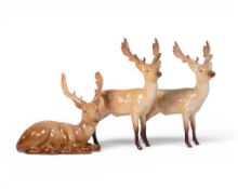 Beswick Standing Stags (2) Model No 981 and Lying Stag Model No 954. (3)