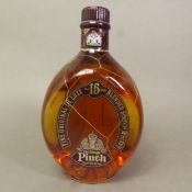 A bottle of Dimple Pinch 15-year-old blended scotch whisky. 43%, 75cl.