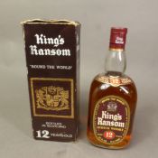 A bottle of King's Ransom 12 year old Scotch Whisky. 75.2 proof. 26% FL. OZS. In original box.
