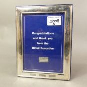 Sterling silver photograph frame presented from Natwest/RBS in 2003, 21cm x 15cm.