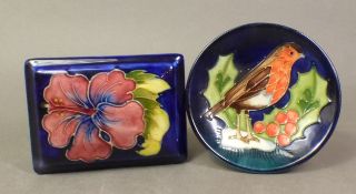 Moorcroft Hibiscus pattern rectangular box and cover, together with a Robin patterned coaster,