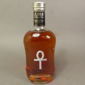 A boxed bottle of The Isle of Jura Superstition single malt Whisky. 43%vol, 70cl.