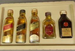 The Johnnie Walker Collection containing four miniature 20cl of Blue Label, Gold Label, Red