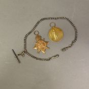 Sterling silver watch chain, 32g, together with two First World War medals issued to Pte. F J Miller