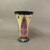 Moorcroft vase in the Foxglove pattern, of trumpet tapering form, marks to the base, dated 93,