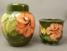 Moorcroft Hibiscus on green ground pattern lidded ginger jar 20.5cm tall together with small