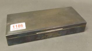Silver cigarette case, no visible hallmarks, but tests as silver, inscription to the front, cedar