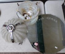 An Art Deco mottled glass light shade, a mid-century glass and chrome light shade, together with a