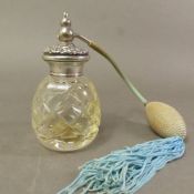 Sterling silver topped, cut glass perfume atomiser.