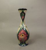 Moorcroft Burslem Poppy pattern vase by Rachel Bishop, height 25.5cm.