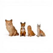 a Group of four animal Figures to include a Melba ware cat with three dog figures by various