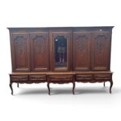 Large French Louis XV style carved oak breakfront, 5 section display cabinet, 2 pieces, cabriole