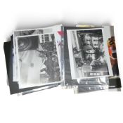 An interesting collection of approximately 30 F1 and race car photographs from 1950's, 60's and 70's
