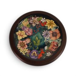A Moorcroft Charger in the Carousel design by Rachel Bishop, in wooden surround, number 271,