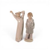 Two Lladro figures to include ' Boy in Robe' model number 4900 together with 'Boy Yawning' model