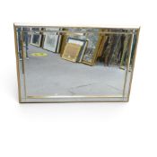 Large rectangular bevelled wall mirror, featuring a gold outer frame with an inner border of