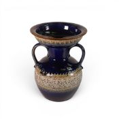 A Doulton Lambeth Stoneware Two Handled vase with bowl type top, decorated in typical cobalt with