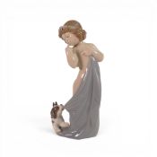 A Lladro figure 'Naughty Puppy' model number 8106, height 19cm, with box , height 18.5cm wear to