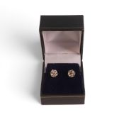 9k gold set diamond earrings, estimated stone weight 1ct, with certificate. 1.48g.