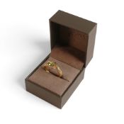 9ct yellow Clogau gold peridot serpent ring, size M, 3.95 g.