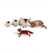 A group of Beswick models to include a Doe model 999a, Standing fox , Black faced sheep and two
