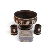 A group of Wedgwood Jasperware pieces to include a Black Jasperware Imperial pedestal Footed bowl, a
