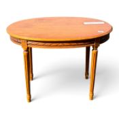 Continental style oak coffee table, with carved decoration on 4 long fluted legs. (H: 56cm x W: