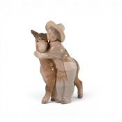A Lladro figure ' Platero and Marcelino' model number 1181, height 20cm .