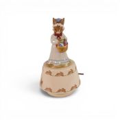 A Royal Doulton Bunnykins Music Box , Easter Parade DB19, Height 19cm.