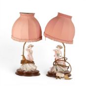 Two Table Lamps with china lady figurines (Royal Doulton Style) mounted on wooden plinths with a