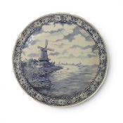A Large Boch Delfts charger decorated in a windmill scene in typical colours , diameter 39.5cm