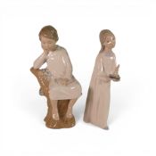 Two Lladro figures to include ' Girl with Candle ' model number 4868 together with little Boy
