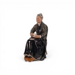 A Royal Doulton Figure , The Cup of Tea HN 2322, height 17cm.