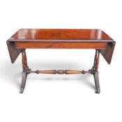 Inlaid regency-style mahogany drop leaf sofa table, with turned central stretcher and lions paw