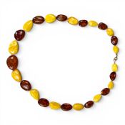 A necklace set with natural & butterscotch amber, 58.5g, purchased from Fortnum & Mason London,